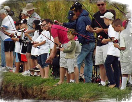 Children fishing at the Fishing Derby